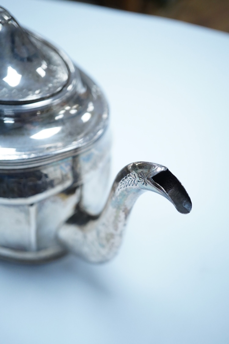 A George III silver oval teapot, by Peter, Ann & William Bateman, London 1804, (a.f.). engraved with floral bands, 14.4oz.
